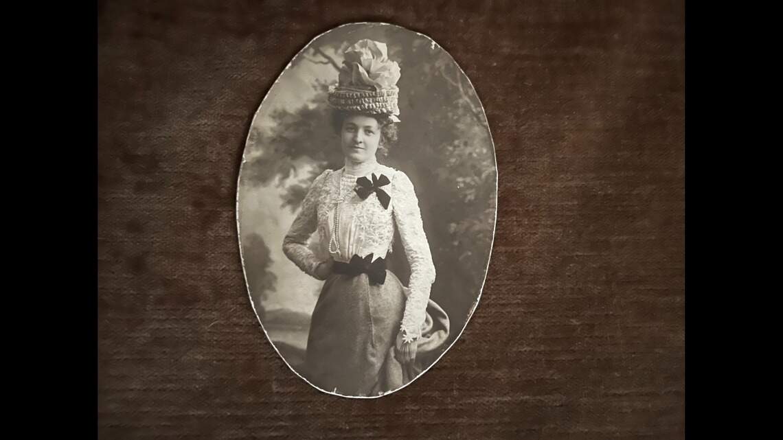 23 and who is she? Reading into sepia-toned photo of distant relative who died young