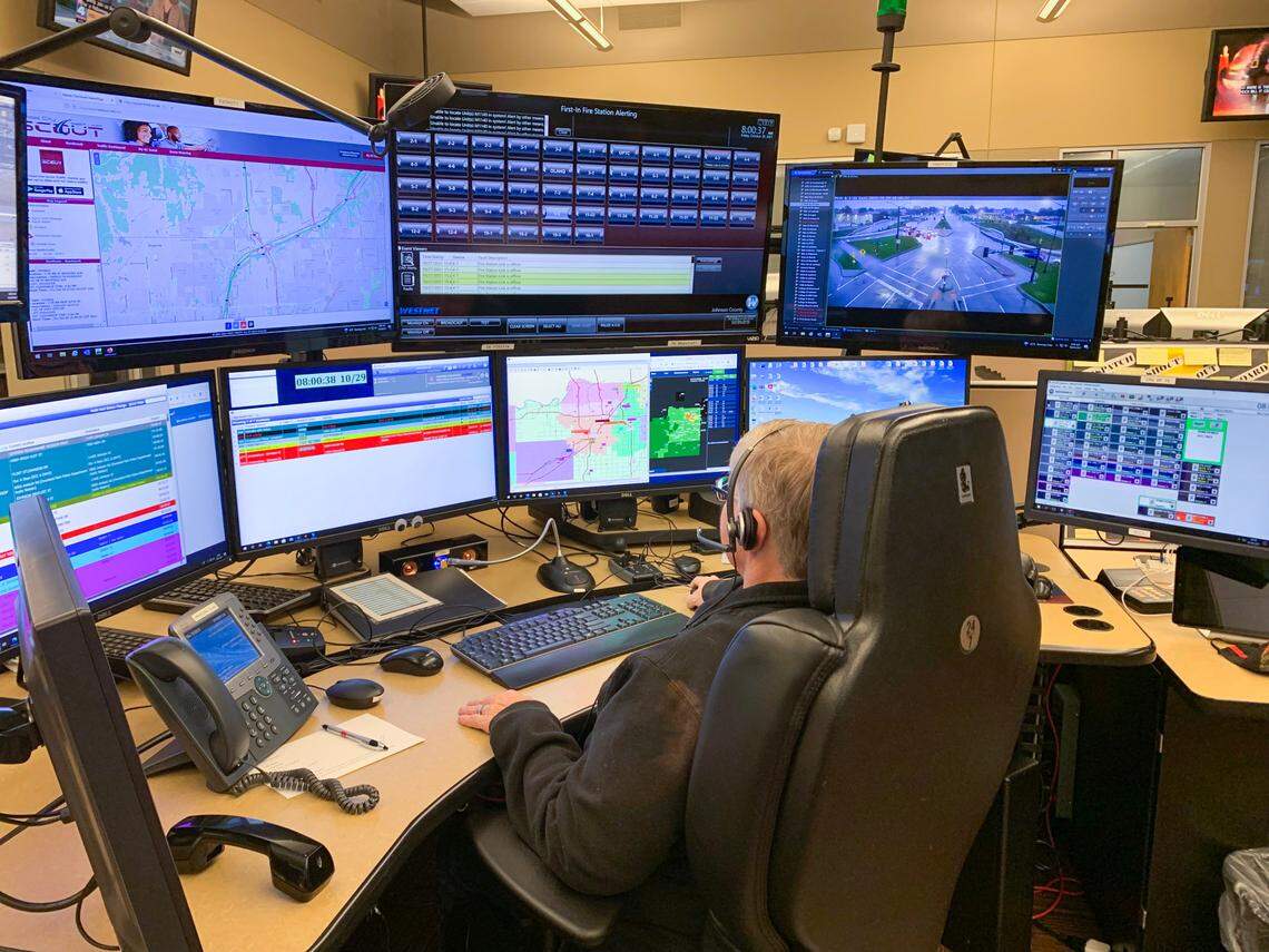 A dispatcher works at the Johnson County Emergency Communication Center in Olathe.