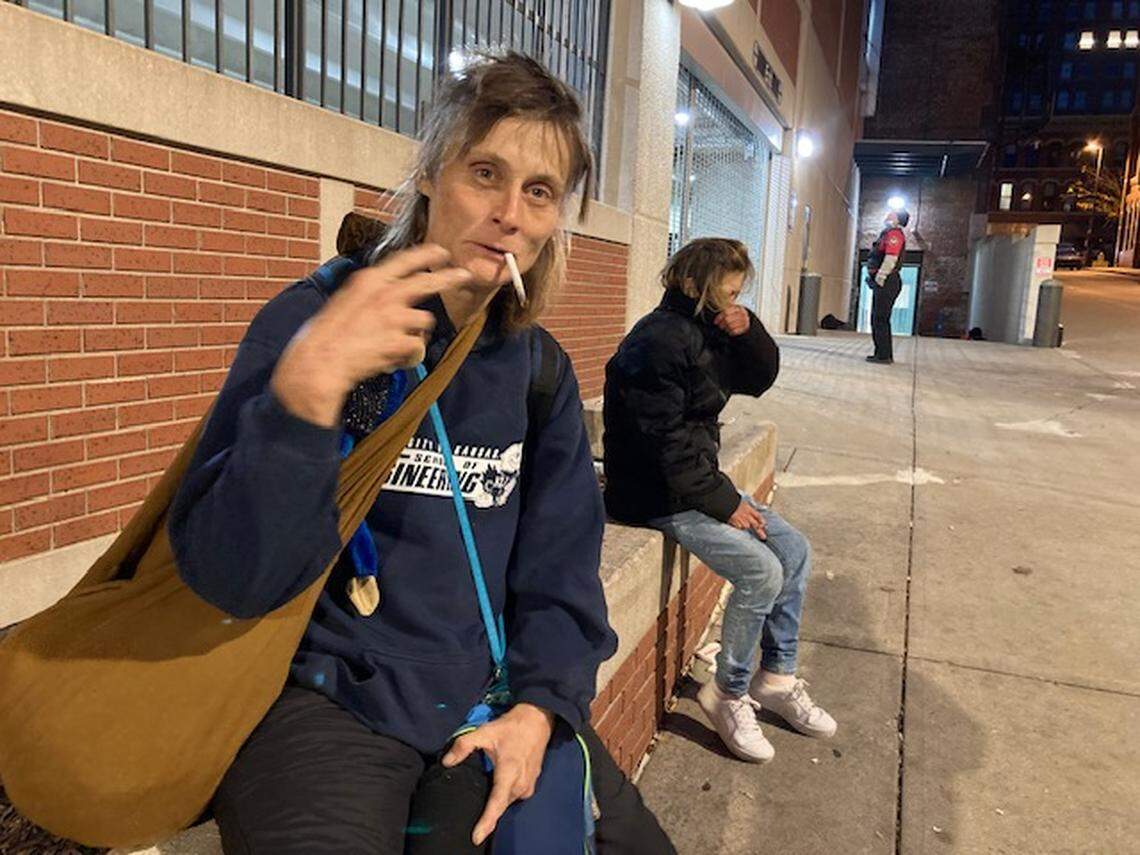 Carolyn Hebeler, 51, known on the streets as Mama Ci Ci, has been homeless on-and-off for 30 years, waits for breakfast at Morning Glory Ministries, run by the Catholic Diocese of Kansas City-St. Joseph at 9th and Baltimore. ”I think they have it in their heads that they’re (homeless people) a problem because they’re homeless, and they stink, or because they’re dirty or filthy or some such scenario,” she said of complaining neighbors. “I think it’s not a problem at all. A lot of people don’t understand. We’ve been through things.”