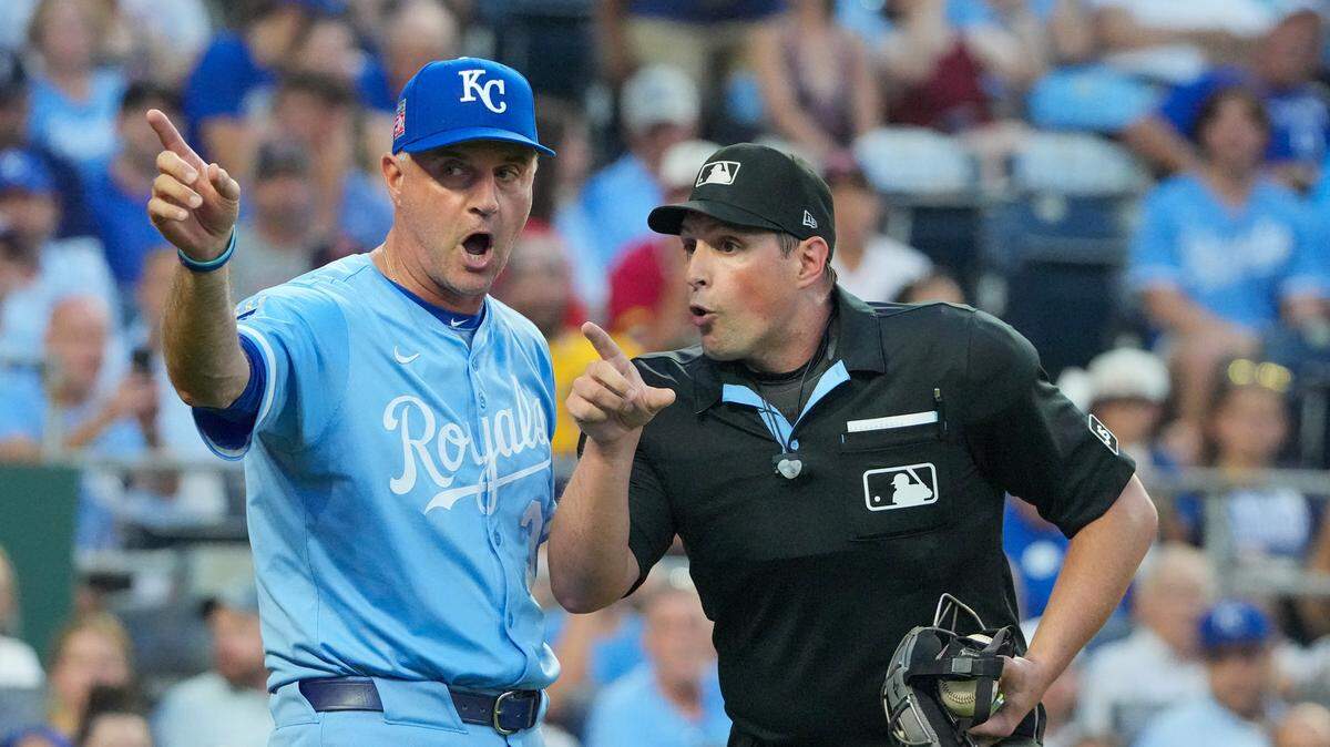 Royals manager Matt Quatraro, left, argues with home plate umpire Quinn Wolcott during the sixth inning of Game 2 of a doubleheader against the Cleveland Guardians at Kauffman Stadium in Kansas City on Saturday, July 26, 2025.