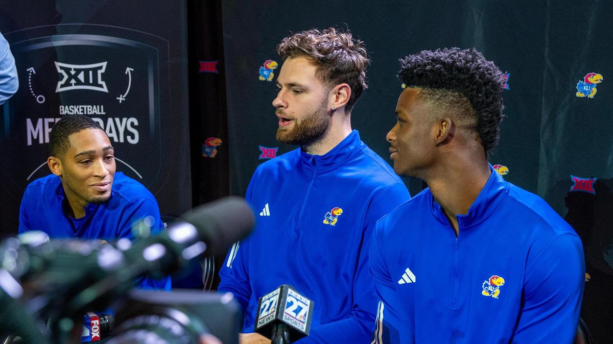 Kansas Jayhawks, from left, Dajuan Harris Jr., Hunter Dickinson and KJ Adams answer questions during Big 12 Men’s Basketball Media Day at T-Mobile Center on Wednesday, October 23, 2024, in Kansas City.