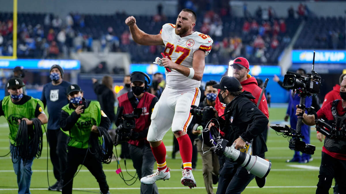 Kansas City Chiefs tight end Travis Kelce celebrates after the Chiefs defeated the Los Angeles Chargers in an NFL football game Thursday, Dec. 16, 2021, in Inglewood, Calif. The Chiefs won 34-28. (AP Photo/Marcio Jose Sanchez)