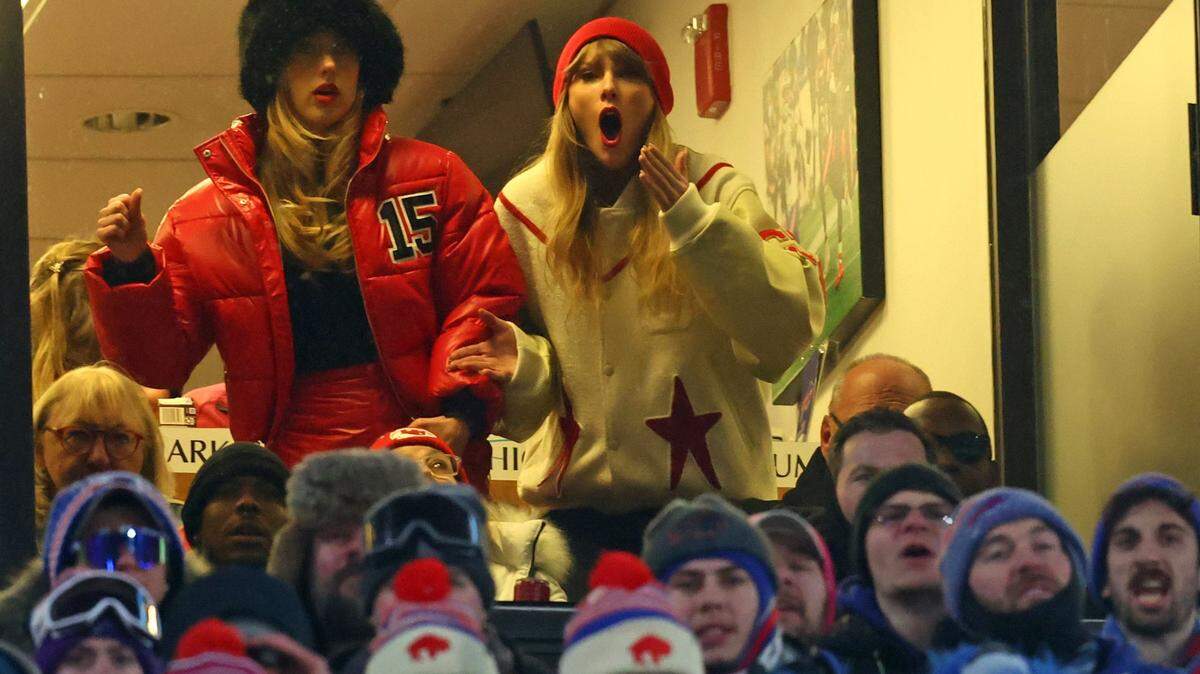 Jan 21, 2024; Orchard Park, New York, USA; Taylor Swift (right) and Brittany Mahomes react after Kansas City Chiefs tight end Travis Kelce (not pictured) scores a touchdown in the 2024 AFC divisional round game between against the Buffalo Bills at Highmark Stadium. Mandatory Credit: Mark J. Rebilas-USA TODAY Sports