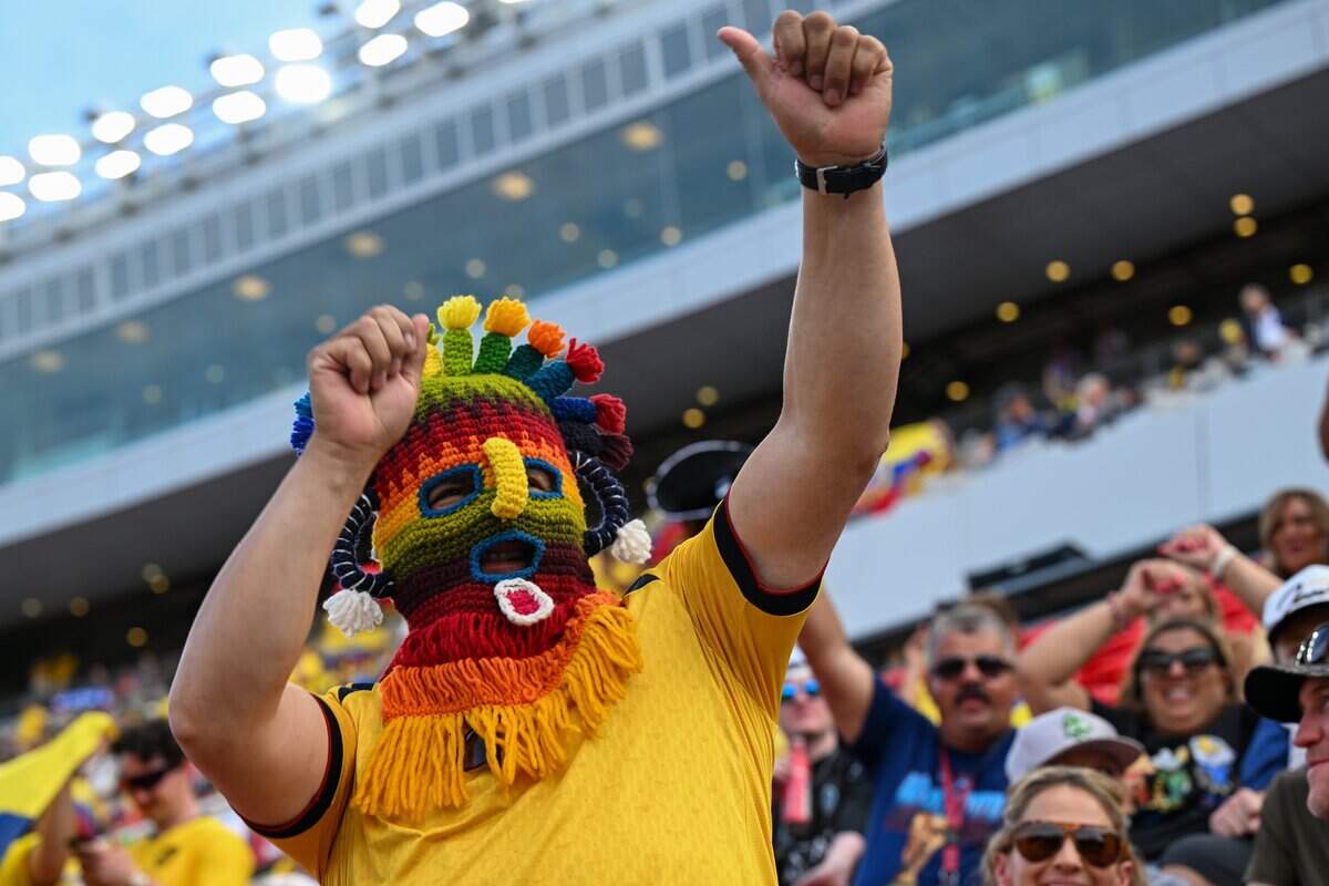 An Ecuadorian fan cheers in their colorful crocheted mask at the Ecuador vs. Curaçao FIFA World Cup group-stage soccer match at Kansas City (Arrowhead) Stadium in Kansas City on Saturday, June 20, 2026.