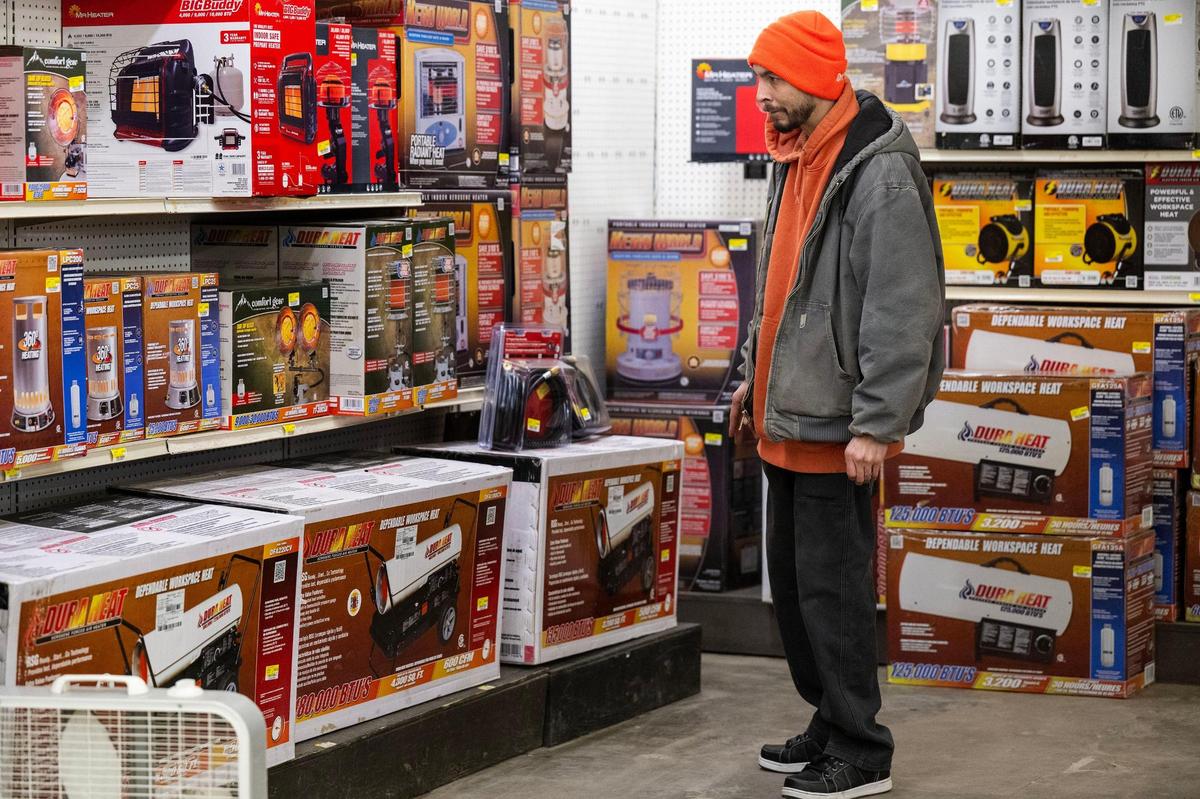 Ahead of the incoming winter storm, Larry Odom,of Roeland Park, shopped for a portable heater at Strasser Hardware on Saturday, Jan. 4, 2024, in Kansas City, Kansas. Odom successfully located a portable heater he needed.
