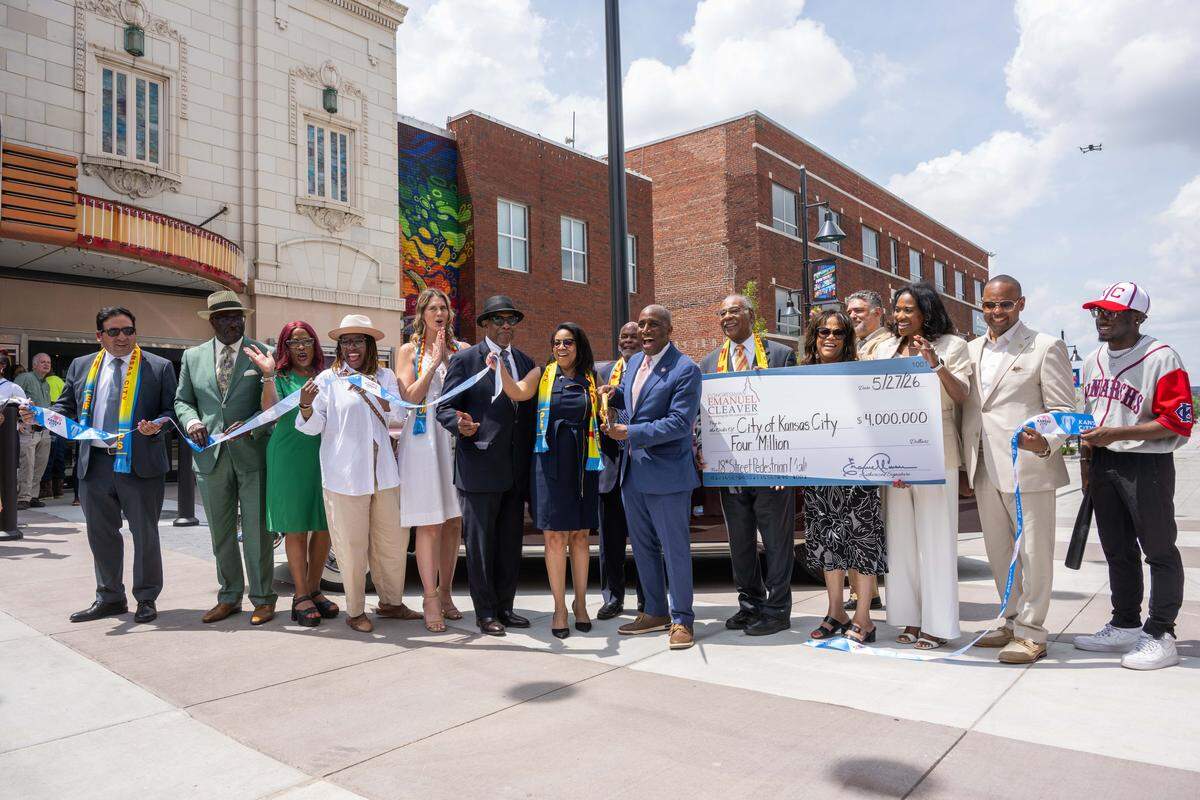 Kansas City community leaders and elected officials cut the ribbon at the re-opening of the pedestrian mall in the 18th & Vine Jazz District on Wednesday, May 27, 2026, in Kansas City.