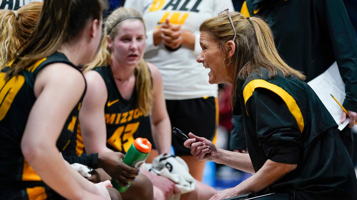 Missouri head coach Robin Pingeton talks with her team in the second half of an NCAA college basketball game against Arkansas at the women’s Southeastern Conference tournament Thursday, March 3, 2022, in Nashville, Tenn. (AP Photo/Mark Humphrey)