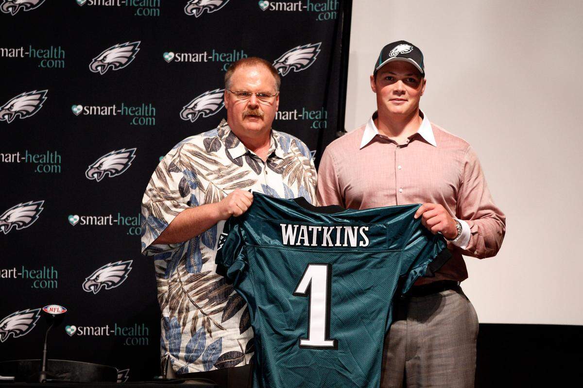 Philadelphia Eagles head coach Andy Reid, left, and first-round draft pick Danny Watkins pose before during an NFL football news conference at the Eagles practice facility Friday, April 29, 2011, in Philadelphia. (AP Photo/Matt Slocum)