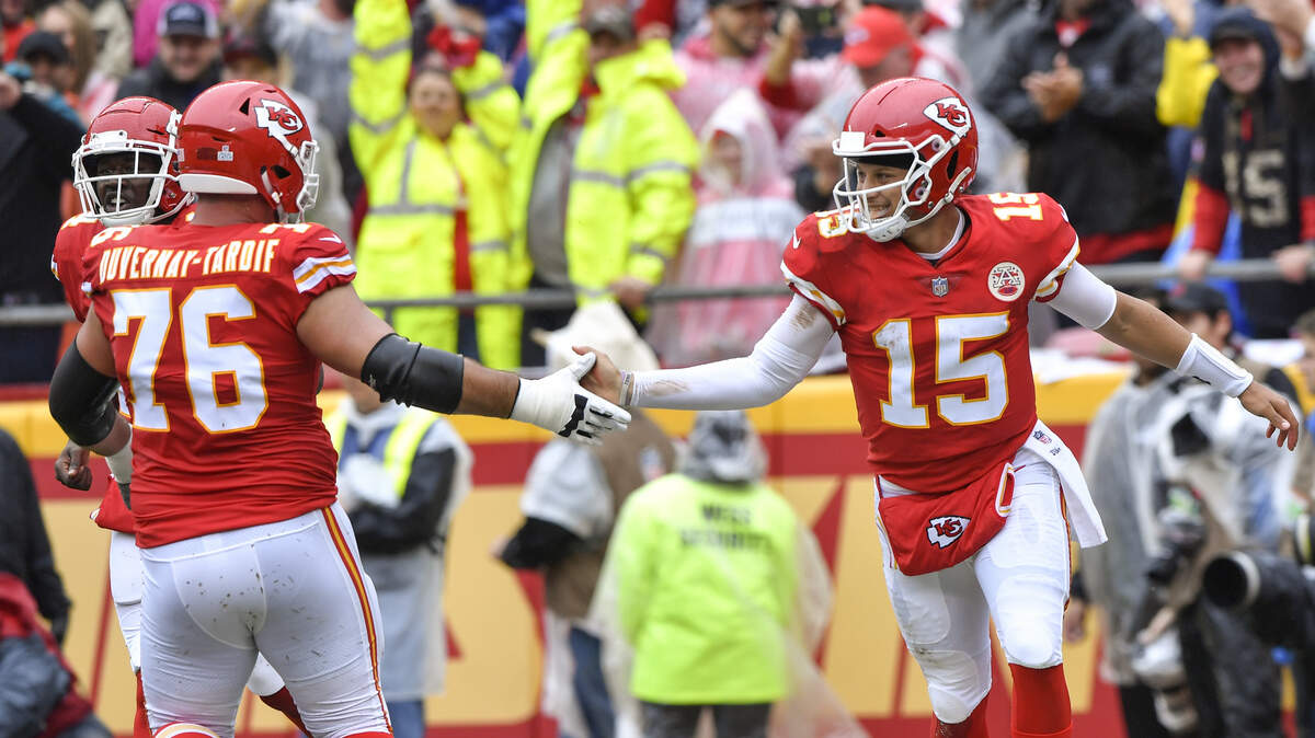 Chiefs quarterback Patrick Mahomes celebrates his first-quarter touchdown run against the Jaguars Sunday at Arrowhead.