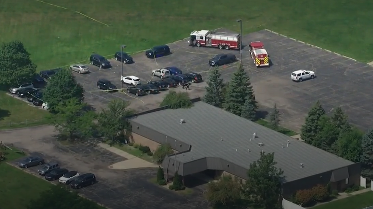 A woman died after being shot by her ex-boyfriend outside her workplace, Michigan authorities say.