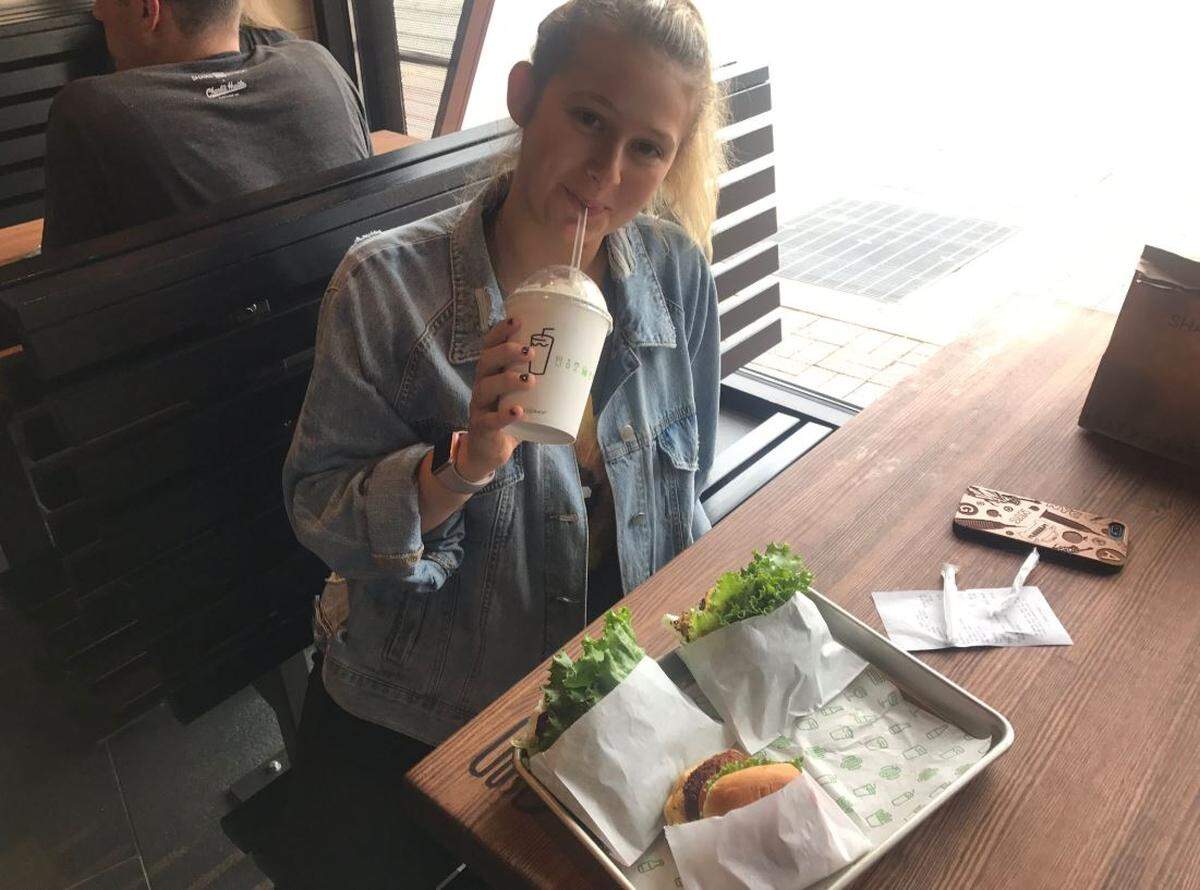 Lily Goodwin was the first in line at 6 a.m. Thursday for the opening of Shake Shack on Country Club Plaza.