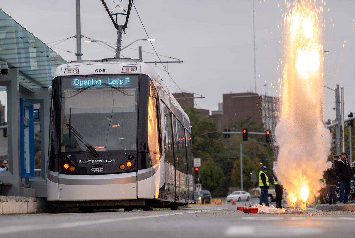 A puff of smoke signaled the opening of the Kansas City Streetcar's Main Street extension, which began service for riders at the new Country Club Plaza stop on Friday, October 24, 2025.