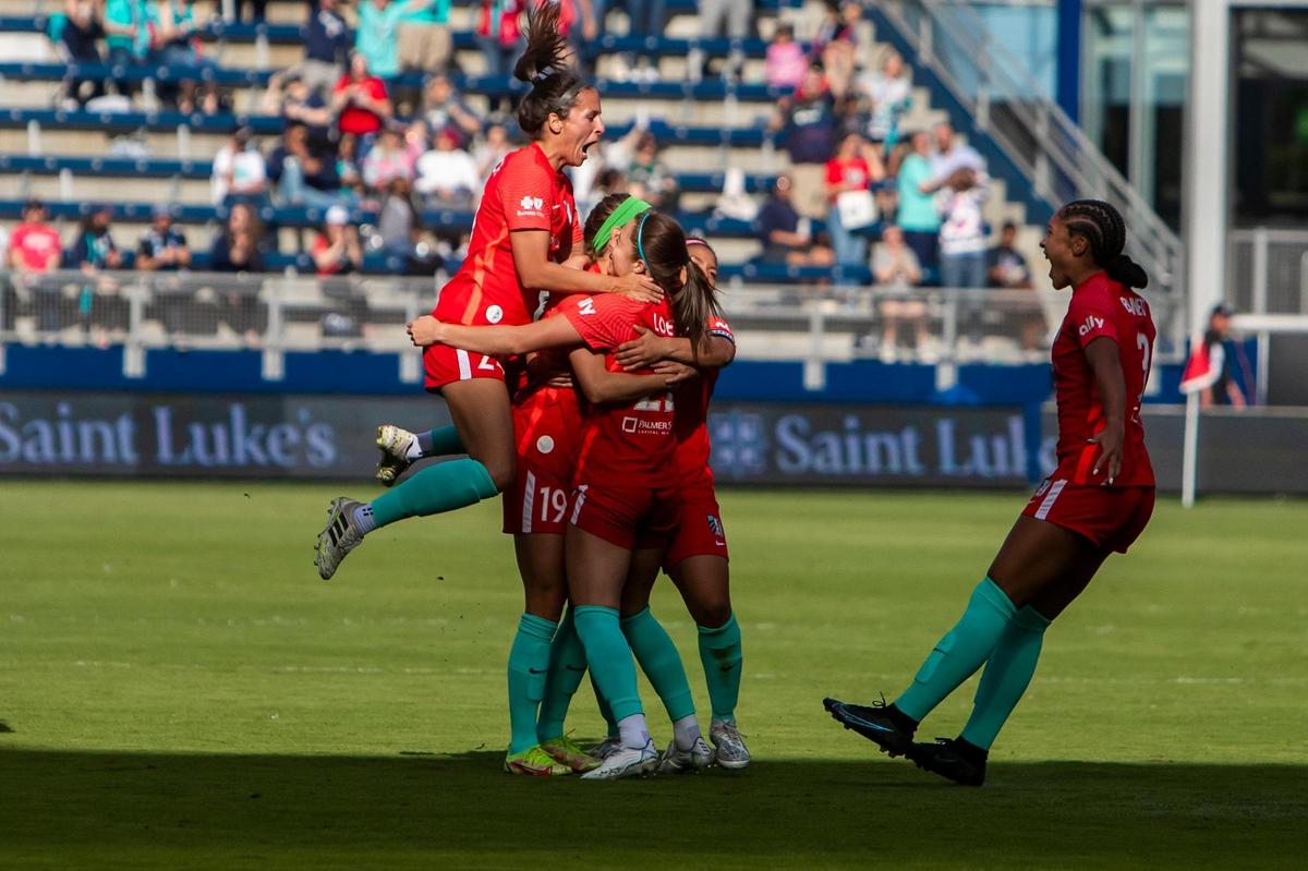 KC Current defender Alex Loera (top left) celebrates the opening goal, her first as a pro, during a 2022 NWSL Challenge Cup match against Chicago at Children’s Mercy Park in Kansas City, Kansas.