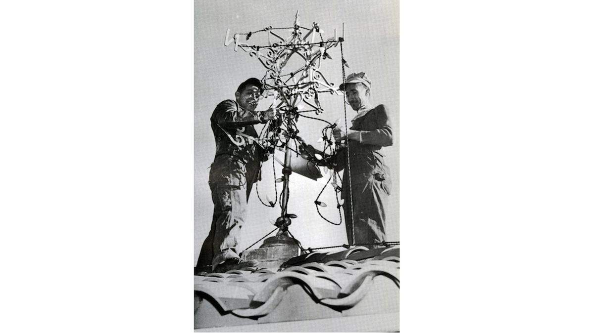 Workers installing the Plaza lights, The Plaza Magazine, November 1972