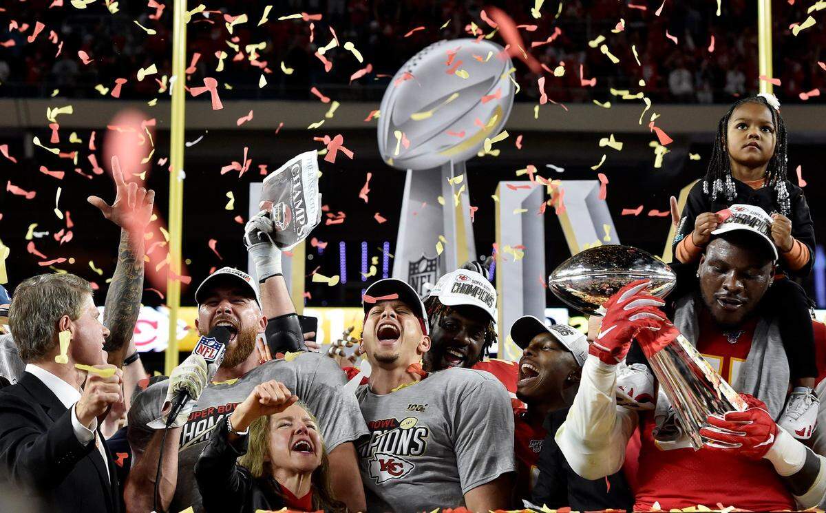 Chiefs chairman Clark Hunt, tight end Travis Kelce, Mahomes and defensive end Frank Clark and his daughter were among the celebrants with the Vince Lombardi Trophy after KC beat San Francisco in Super Bowl LIV in Miami.