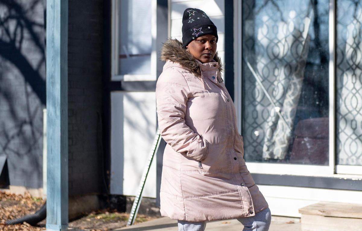 Aaliyah Ross poses for a photo outside of her unit at Stonegate Apartments on Friday, Jan. 13, 2023, in Kansas City.