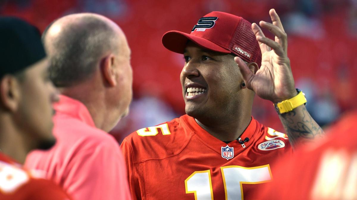 Kansas City Royals catcher Salvador Perez waves to the crowds during the Chiefs warm up before the game against Buffalo on Sunday, Oct. 10, 2021, at Arrowhead Stadium in Kansas City.