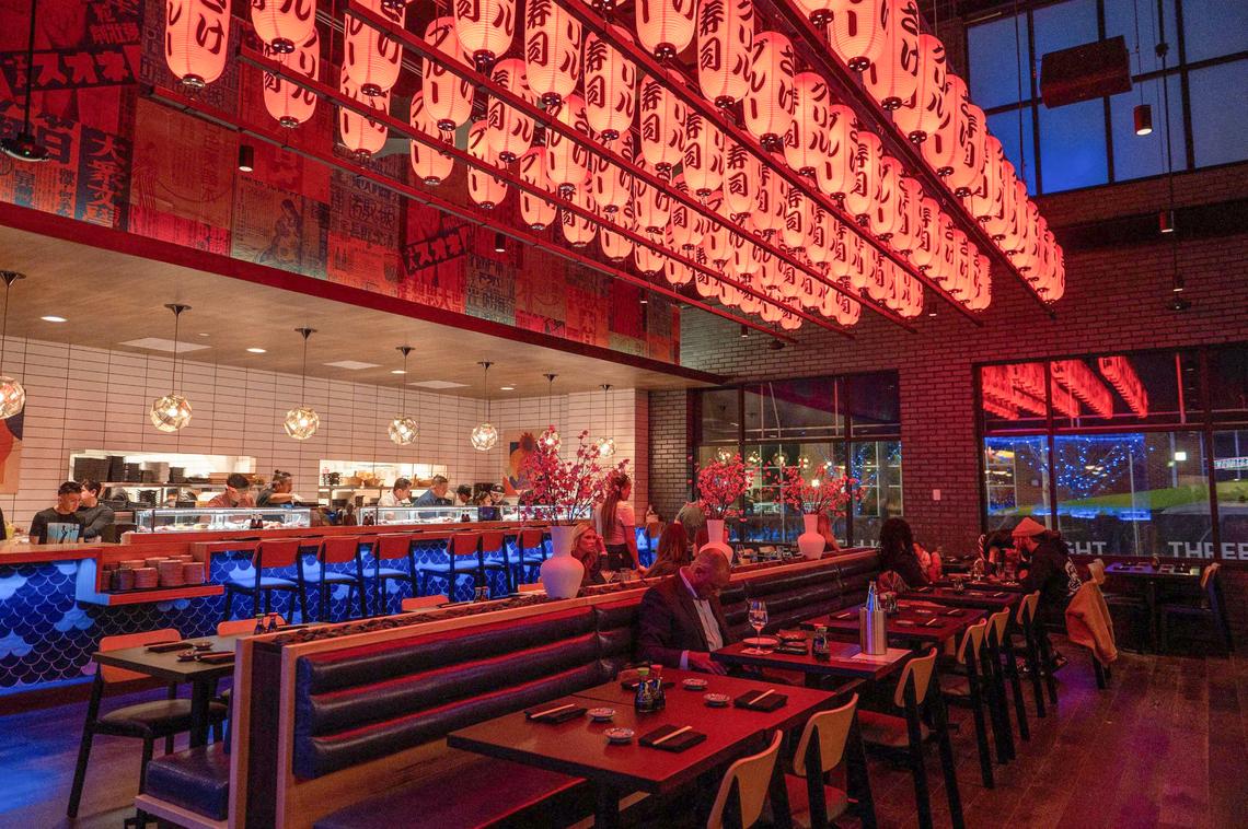 Red Japanese lanterns decorate Blue Sushi Sake Grill.