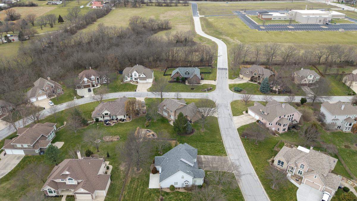 Some residents of a nearby neighborhood are opposed to the proposed site of The View High Sports Complex, upper left, at 3301 NW Ashurst Dr. in Lee's Summit. The 17-acre field, pictured on March 23, 2026, is slated for a 180,000-square-foot facility anchored by a massive inflatable soccer dome.