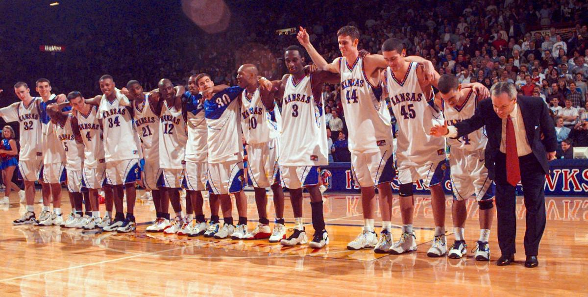 Saying thanks to their fans, the Kansas basketball team takes a collective bow with coach Roy Williams leading the way at right after they beat Oklahoma 83-70, Feb. 23, 1998, in Lawrence, Kan. It was the last home game of the season and also their 60th straight win at Allen Fieldhouse.