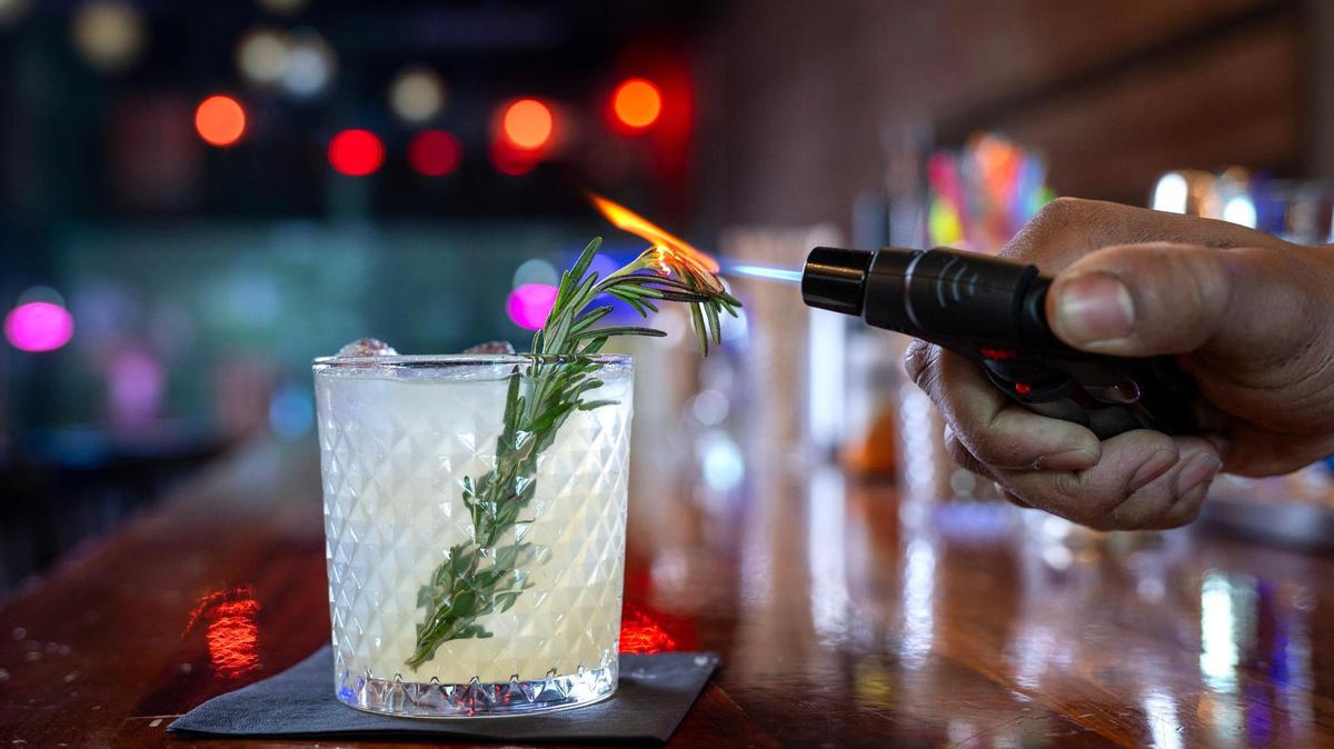 The Truman & McGee, a cocktail made with gin, elderflower, cucumber, lime cordial, and a hint of smoked rosemary, is served at In Good Company—a new members-only cocktail bar at 1518 McGee St. in Kansas City’s Crossroads Arts District.
