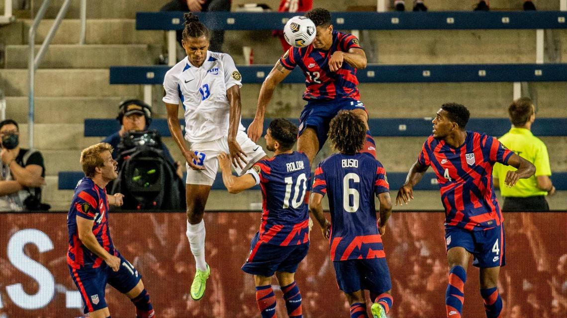 United States defender Miles Robinson (12) headbutts the ball out of the air in the second half against Martinique, Thursday, July 15, 2021 at Children’s Mercy Park in Kansas City, Kan.
