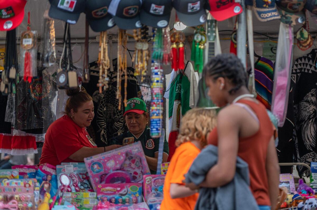 Venders wait for guests during the Cinco de Mayo celebration at Guadalupe Center on Friday, May 5, 2023, in Kansas City.