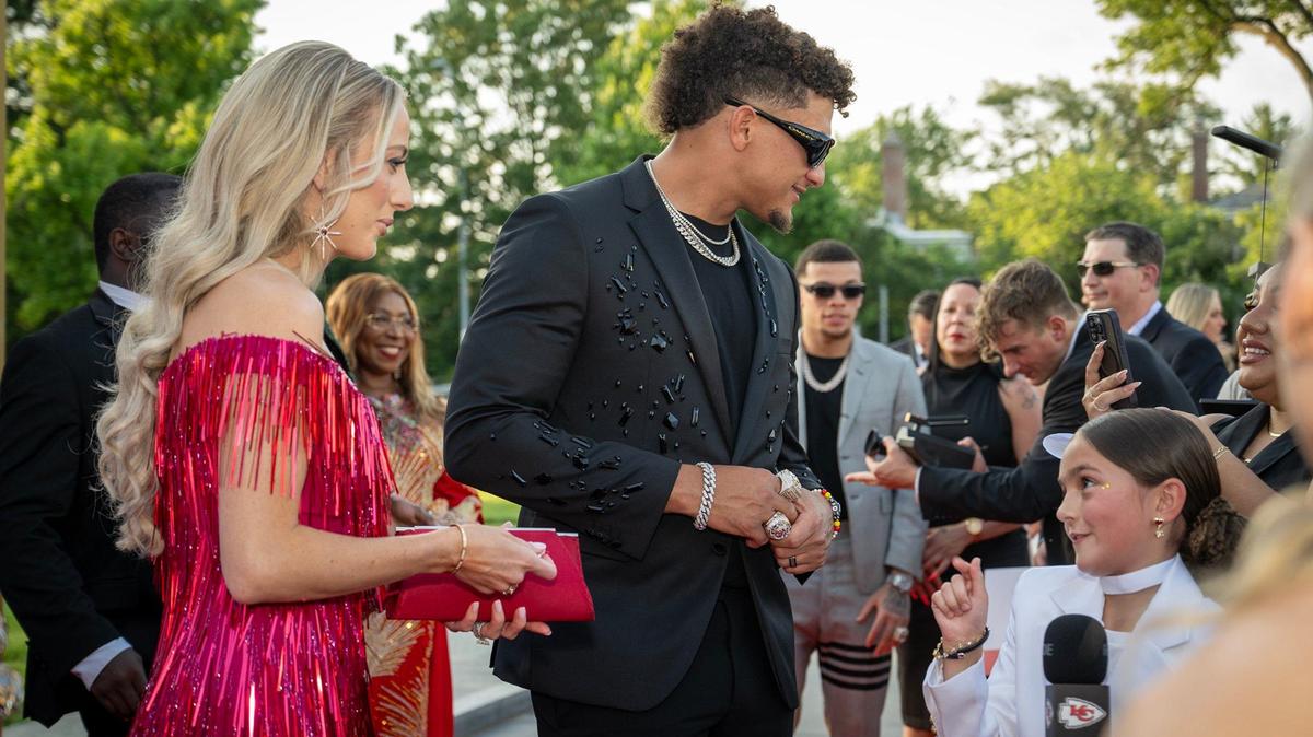 Brittany Mahomes and Patrick Mahomes, Chiefs quarterback, talk to Taylen Biggs, a social media personality, as they walked the red carpet before the Super Bowl LVIII championship ring presentation event on Thursday, June 13, 2024, at The Nelson-Atkins Museum in Kansas City.