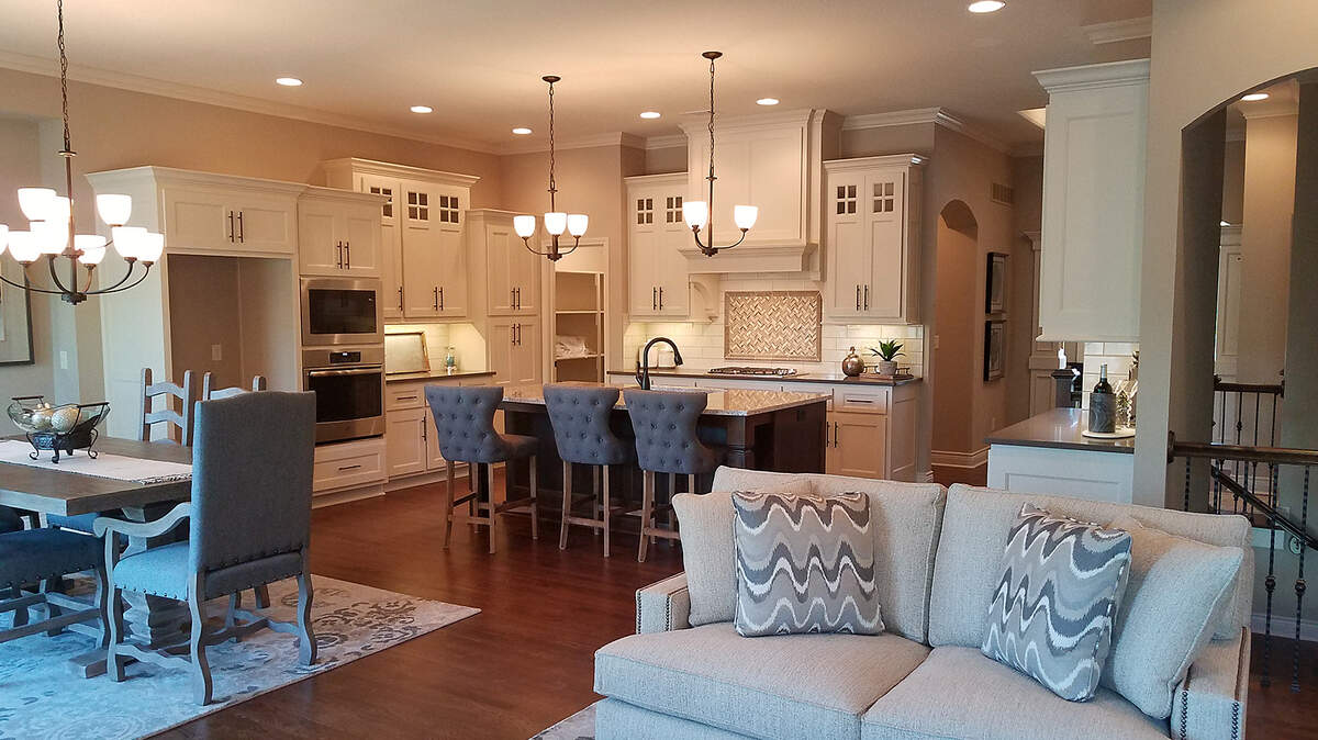 The living space flows into the well-appointed kitchen and dining areas for gracious living and entertaining in the Gatewood Villas Rockwood plan.
