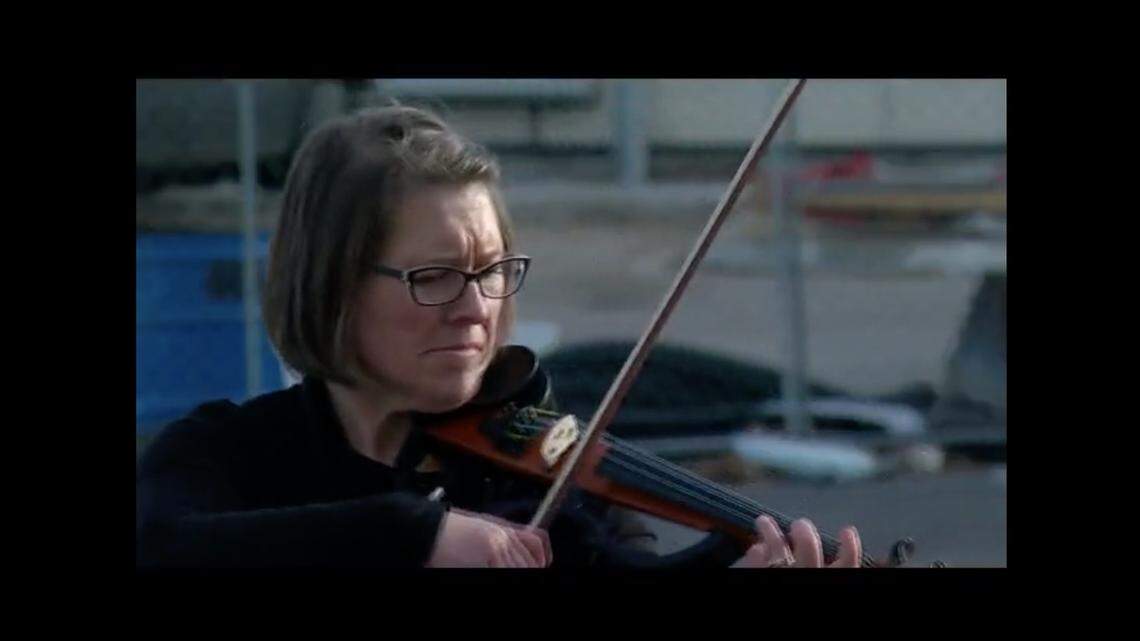 Violinist Natalie VanBurkleo-Carbonara has played 70 parking lot concerts at care facilities in Minnesota since the onset of the coronavirus pandemic.
