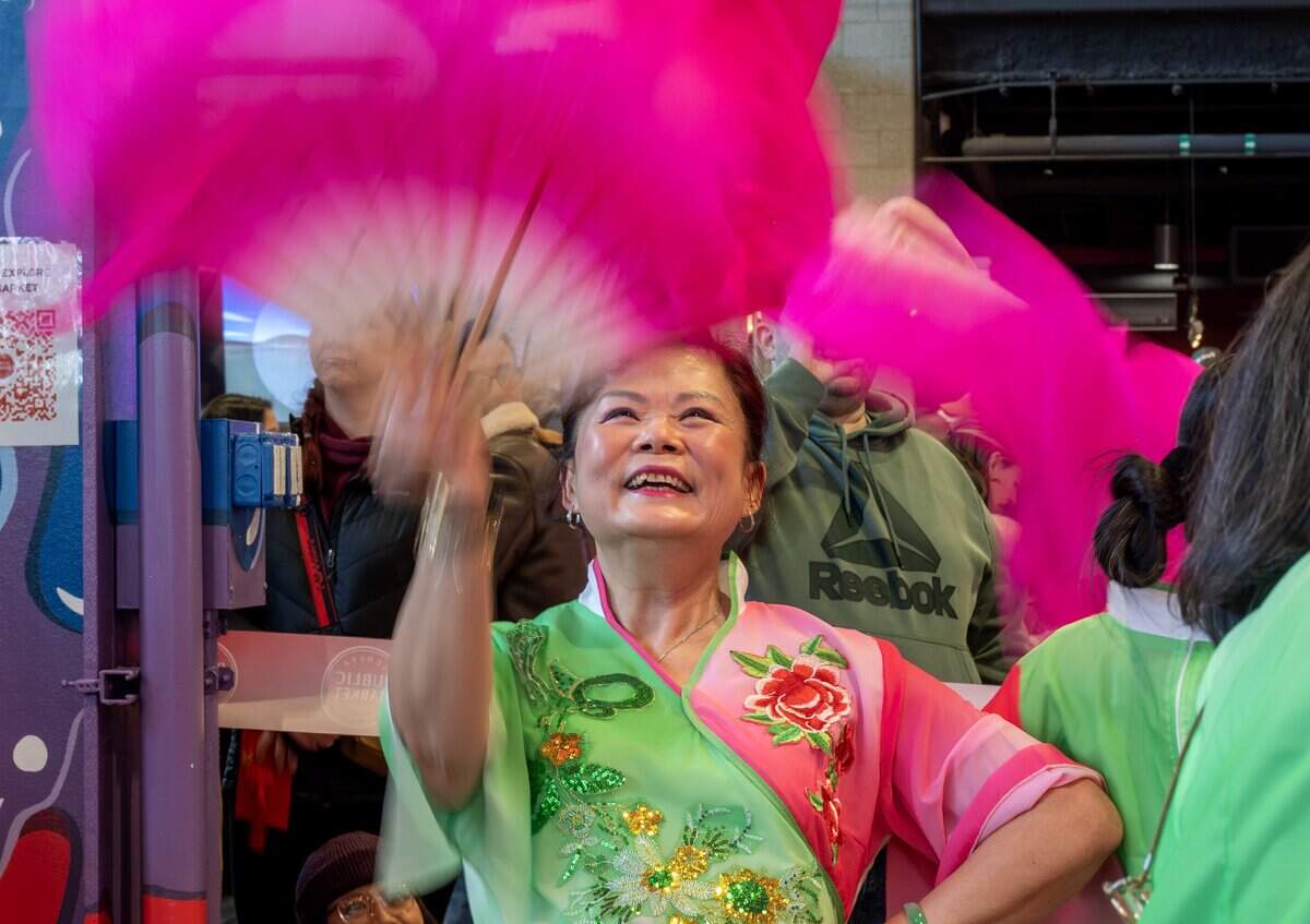 Hoikei Au performs a dance during a Lunar New Year celebration at the Lenexa Public Market on Sunday, Feb. 22, 2026, in Lenexa, Kan.