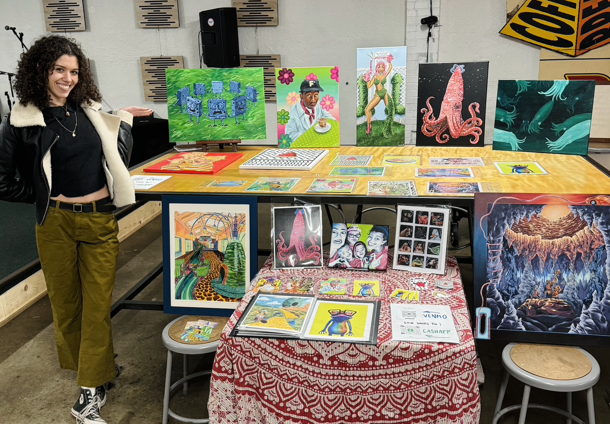 Olivia Barbosa with her artwork.