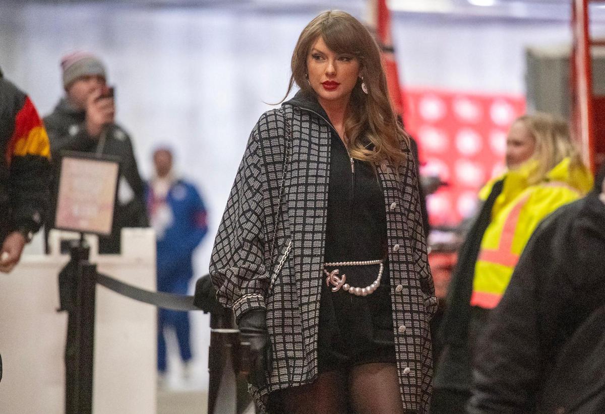 Taylor Swift, in only her second public appearance of the new year, wore Chanel to the Kansas City Chiefs game against the Houston Texans in their AFC Divisional Round playoff match Saturday at GEHA Field at Arrowhead Stadium on Jan. 18, 2025.