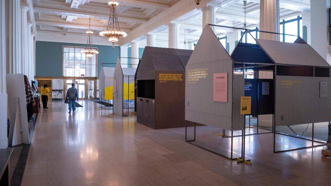 For the “Evicted” exhibit, the main hall of the Kansas City Public Library’s Central location downtown is filled with homes depicting the housing crisis.