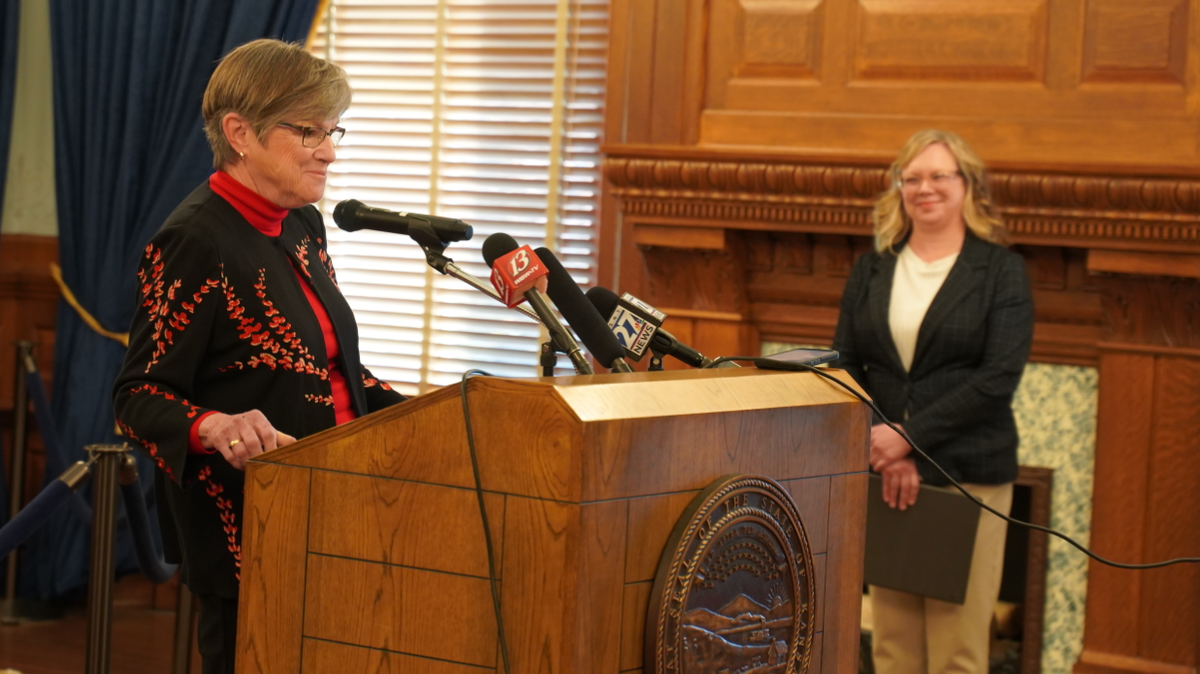 Gov. Laura Kelly delivers remarks about Kansas’ revamped unemployment insurance system portal next to Secretary of Labor Amber Shultz.