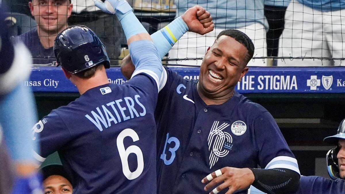 Kansas City Royals center fielder Drew Waters (6) celebrates with catcher Salvador Perez (13) after hitting a solo home run against the Colorado Rockies in the third inning at Kauffman Stadium on June 2, 2023.