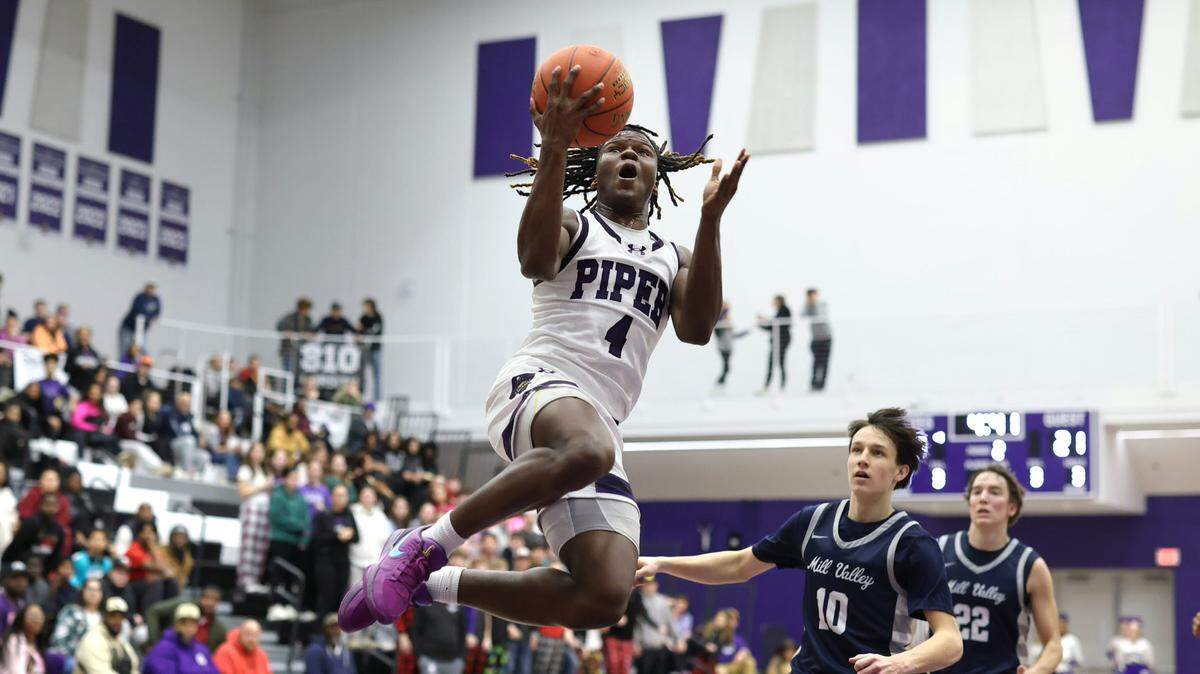 Piper’s Alamar Brooks sails for a layup in the Pirates’ 75-62 win over Mill Valley in 810 Varsity Showcase 39 on Saturday, Jan. 11, 2024.