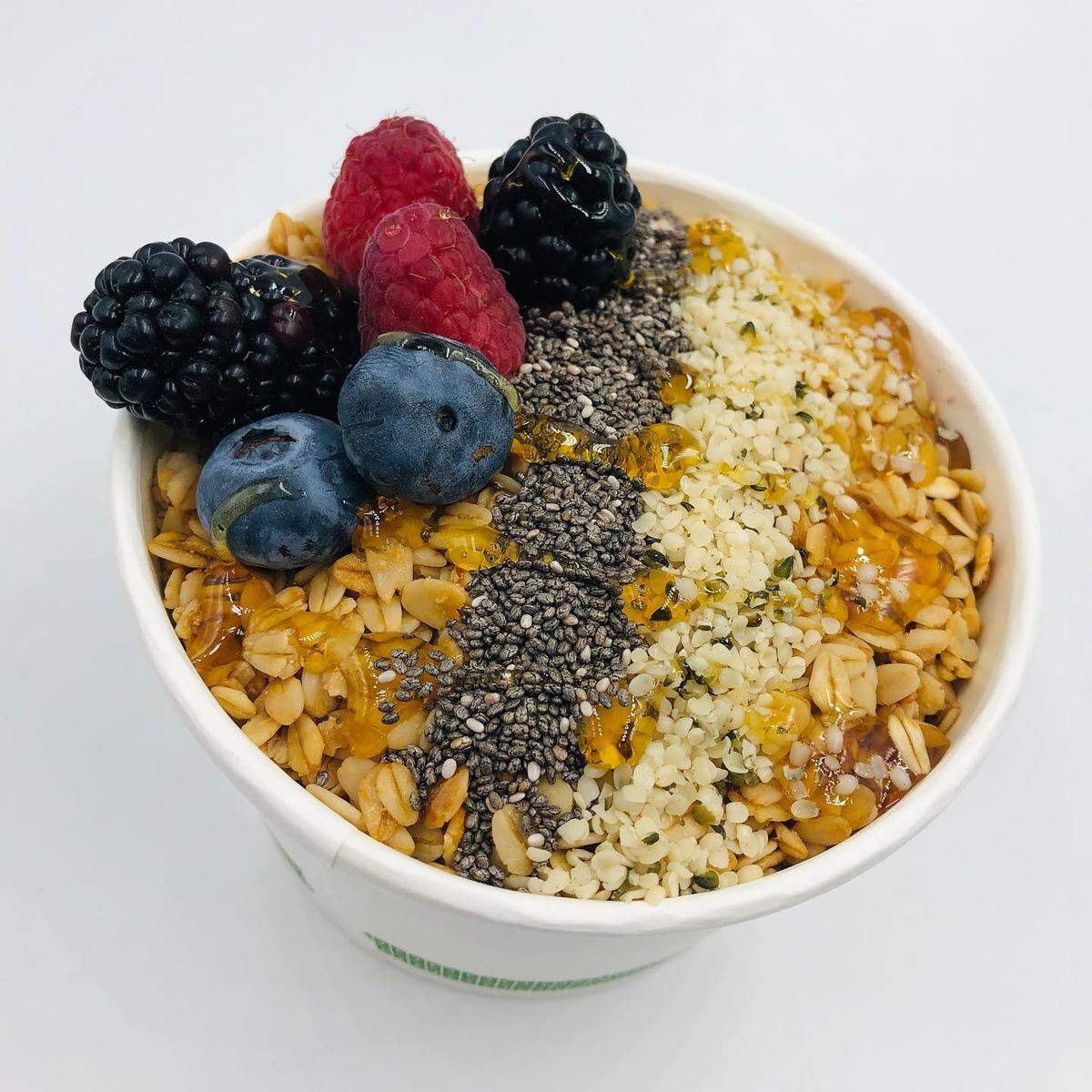 Pura’s Garden Bowl with acai, granola, chia seeds, hemp seeds and fresh berries with a drizzle of honey or agave.