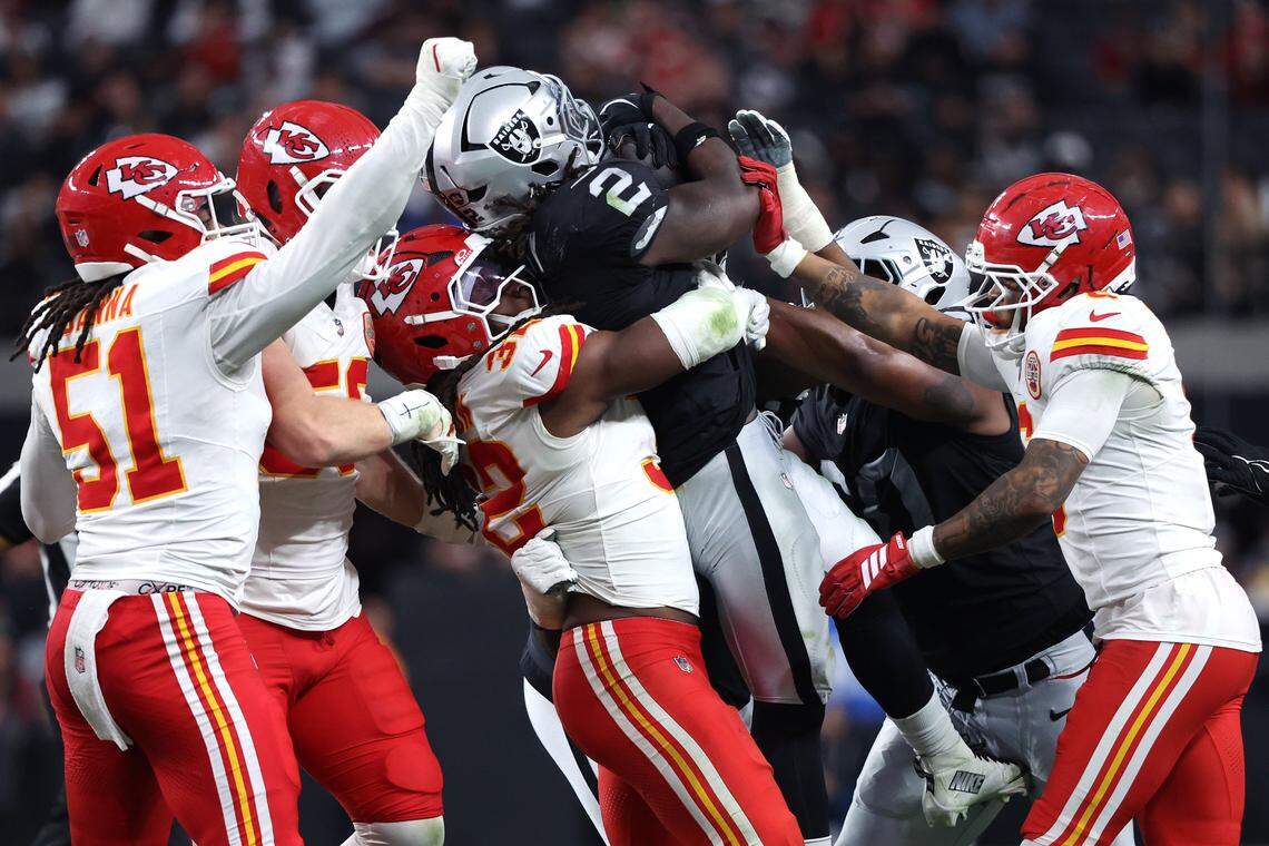 Kansas City Chiefs linebacker Nick Bolton (No. 32) tackles Raiders running back Ashton Jeanty during an NFL Week 18 game at Allegiant Stadium in Las Vegas on Sunday, January 4, 2026.