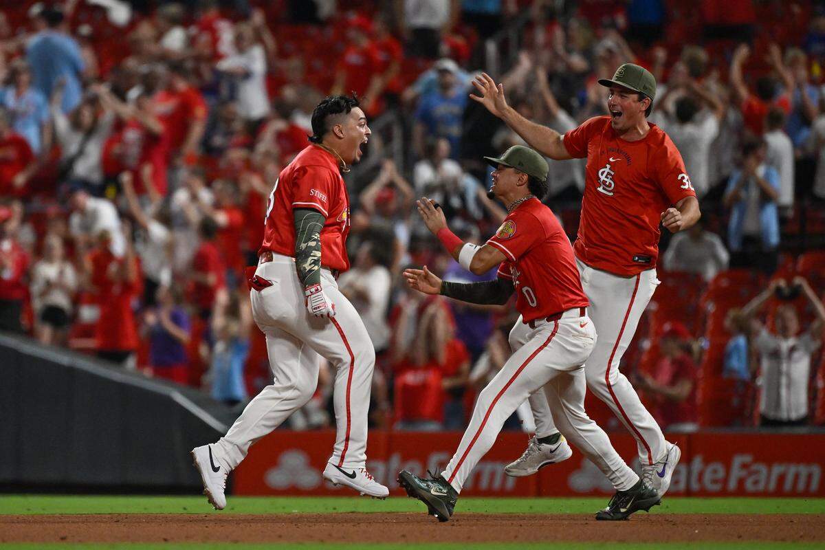 Cardinals players celebrate their walk-off 5-4 victory over the Kansas City Royals in 11 innings on Friday, May 15, 2026 at Busch Stadium in St. Louis.