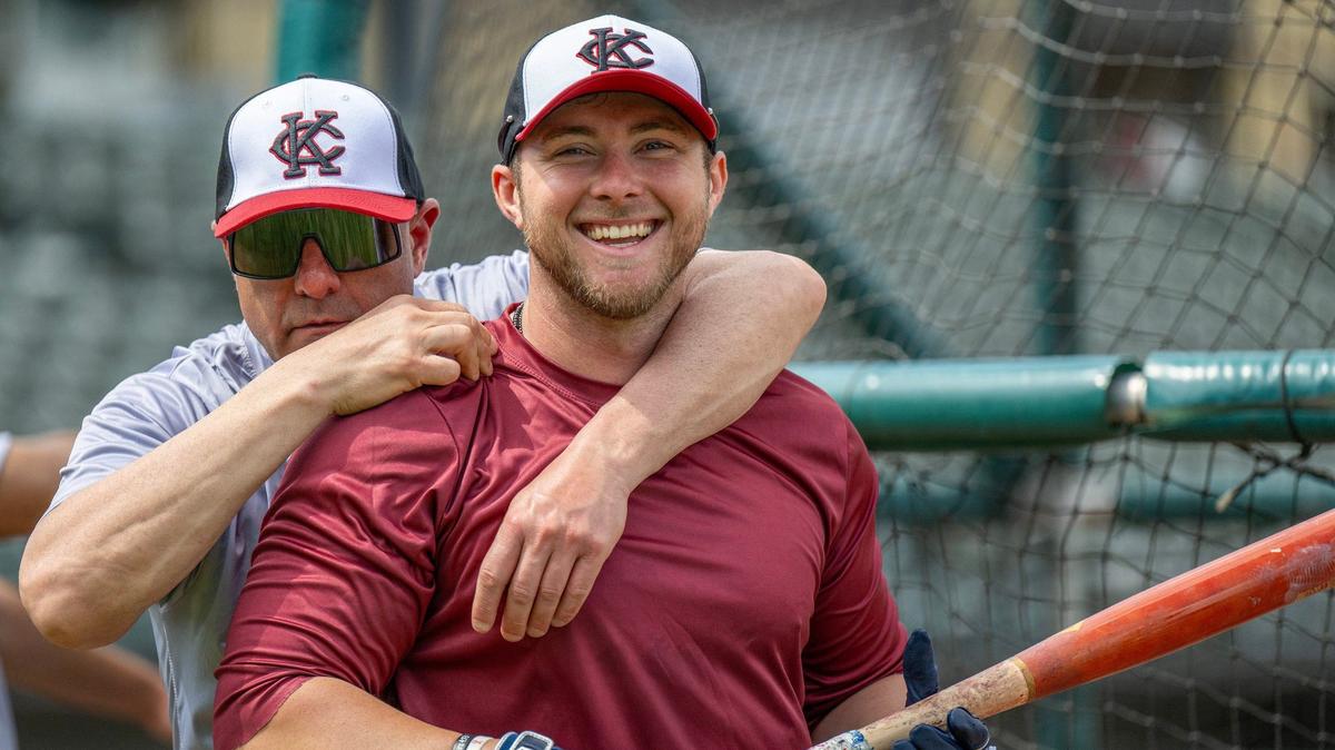 Kansas City Monarchs manager Joe Calfapietra, left, and infielder Cameron Cannon are seen during batting practice at Legends Field on Wednesday, May 8, 2024, in Kansas City, Kansas.