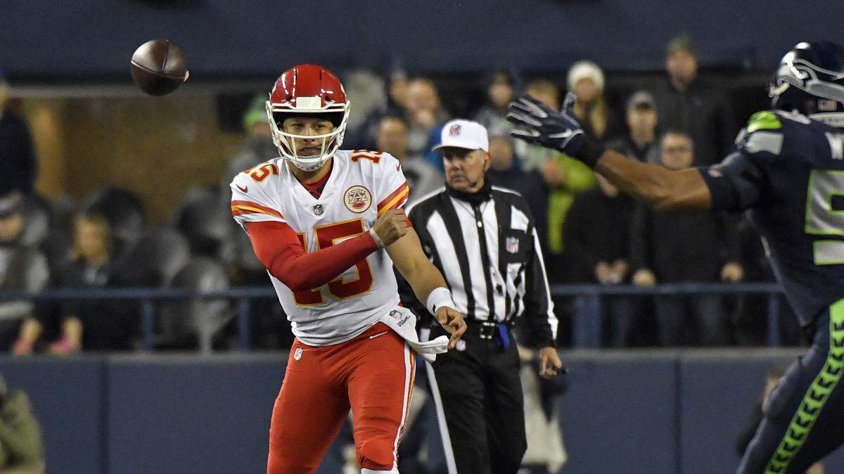 Kansas City Chiefs quarterback Patrick Mahomes made a side arm throw early in the first quarter against the Seahawks during Sunday’s football game on December 23, 2018 at CenturyLink Field in Seattle, Washington.