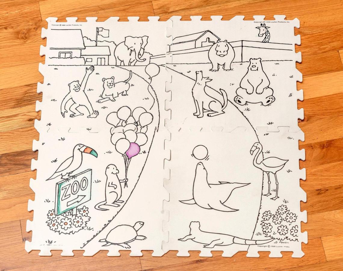 Vanessa Faller’s Color-N-Wash mats can snap together to form a larger surface for creativity. The black outlines are slightly raised to allow for easier coloring within the lines.