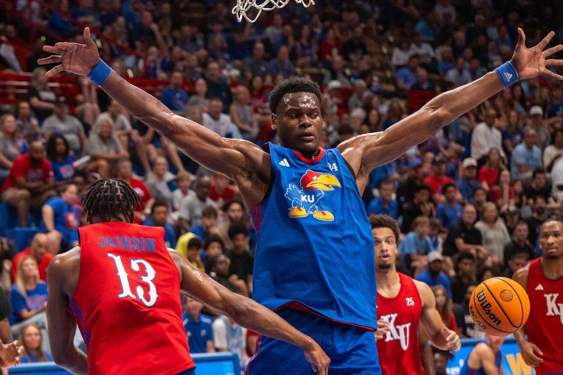 Kansas Jayhawks center Paul Mbiya shows his length during the men's scrimmage at Late Night in the Phog, on Friday, October 17, 2025, in Lawrence.
