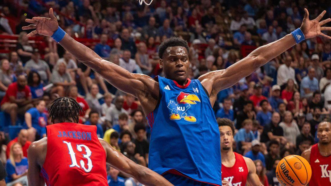 Kansas Jayhawks center Paul Mbiya shows his wingspan during the men’s scrimmage at Late Night in the Phog on Friday, October 17, 2025, in Lawrence.