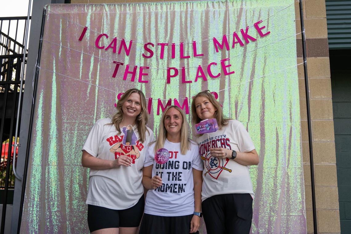 Taylor Swift fans posed at a photo booth at Legends Field during Kansas Swiftie Monarchs night.