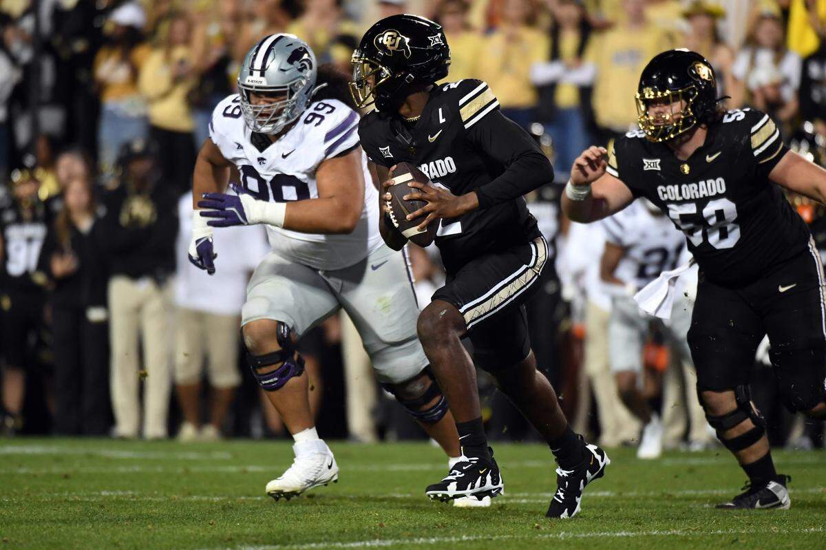 K-State got good pressure on Colorado Buffaloes quarterback Shedeur Sanders (No. 2) throughout Saturday night’s Big 12 football game at Folsom Field in Boulder, Colo.