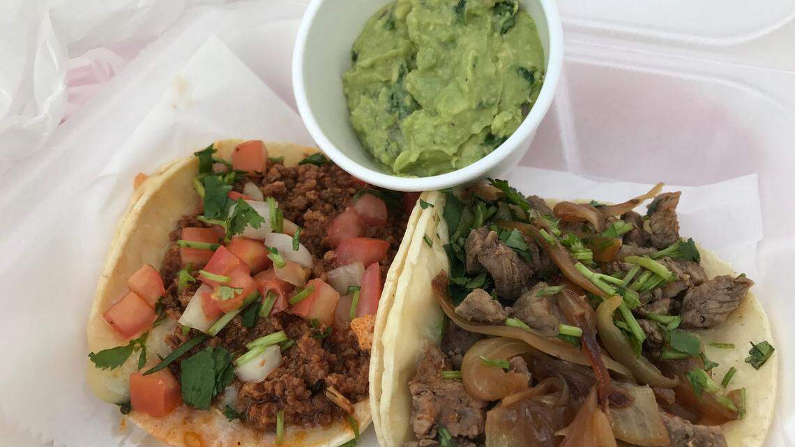 Taco-Cacao’s ground beef and birria tacos with a side of guacamole.