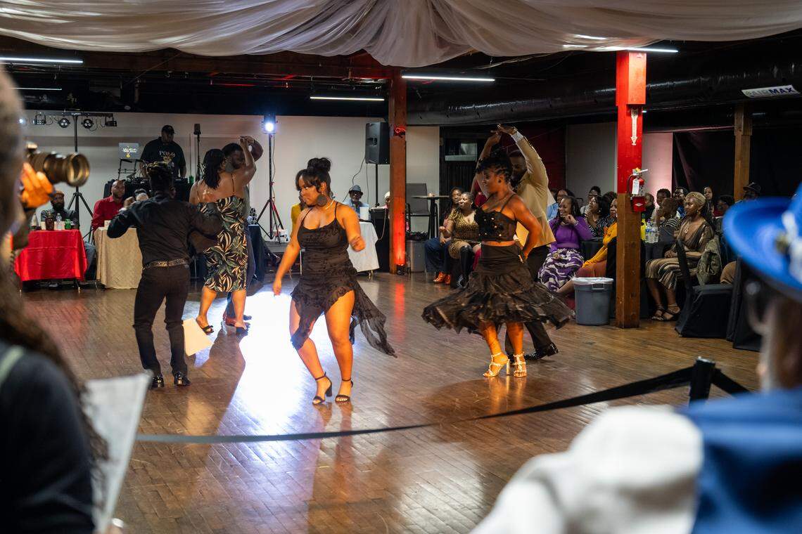 Couples dance during the “Kansas City Two-Step” at The Big StepOff 2025 on Oct. 18, 2025, in Kansas City. The annual competition features couples showcasing their best routine to vie for the title of “King and Queen of Kansas City.” The competition celebrated its 20th anniversary this year.