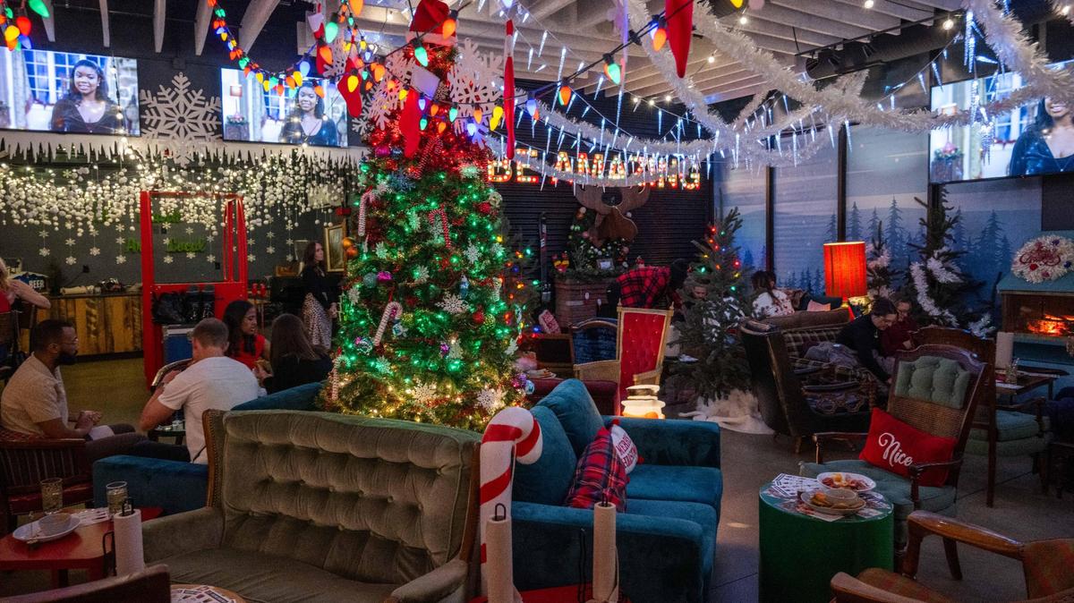 The Holiday Hideaway is the pop-up holiday bar at Chicken N Pickle’s North Kansas City location. It features festive vibes built to look like a ski lodge with igloos, Christmas trees, and outdoor fire pits.